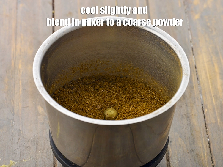 Step 2 – <p><span style="background-color:rgb(255,255,255);color:rgb(0,0,0);">Cool slightly and <strong>blend</strong> in mixer to a <strong>coarse powder</strong>. Keep aside.</span></p>