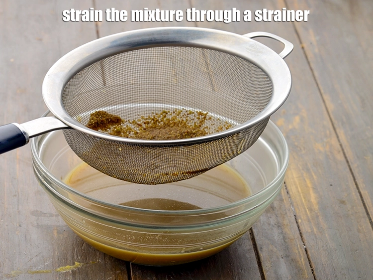 Step 6 – <p><span style="background-color:rgb(255,255,255);color:rgb(0,0,0);"><strong>Strain</strong> the mixture through a strainer.</span></p>