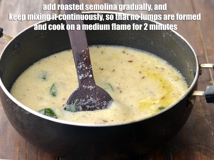 Step 15 – <p><span style="background-color:rgb(255,255,255);color:rgb(0,0,0);">Add the <strong>roasted semolina gradually</strong>, and keep mixing it continuously, so that no lumps …