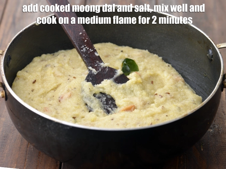 Step 16 – <p><span style="background-color:rgb(255,255,255);color:rgb(0,0,0);">Add the <strong>cooked moong dal</strong> and </span><a href="https://www.tarladalal.com/glossary-salt-namak-table-salt-418i"><u>salt </u></a><span style="background-color:rgb(255,255,255);color:rgb(0,0,0);">to taste, mix well and …