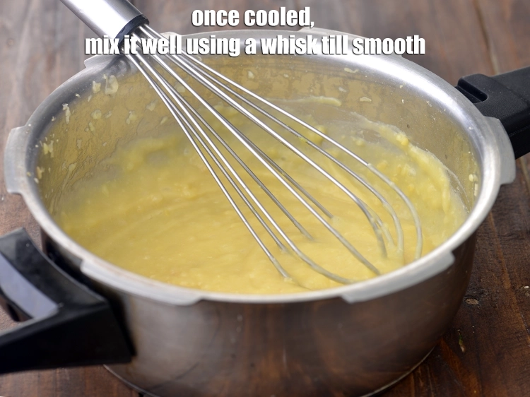Step 7 – <p><span style="background-color:rgb(255,255,255);color:rgb(0,0,0);">Once cooled, mix it well using a <strong>whisk till smooth</strong>. Keep aside.</span></p>