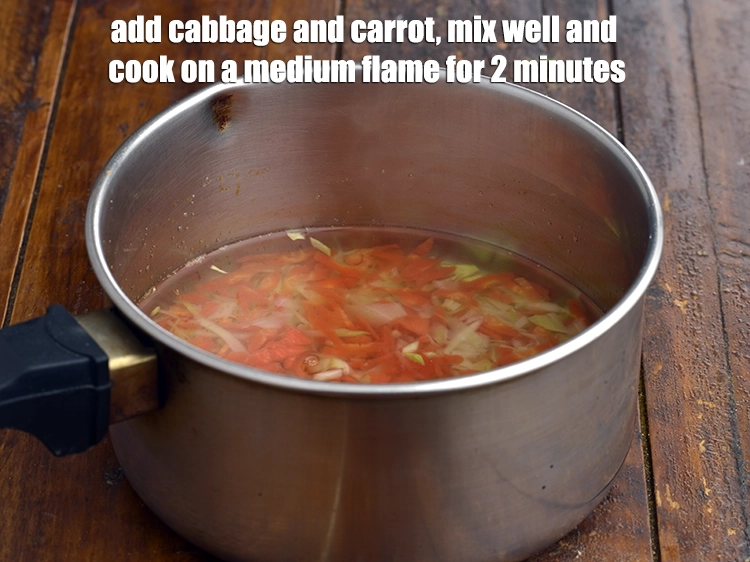 Step 3 – <p><span style="background-color:rgb(255,255,255);color:rgb(0,0,0);">Add the 1/2 cup </span><a href="https://www.tarladalal.com/glossary-cabbage-patta-gobi-kobi-248i#ing_2363"><u>chopped cabbage</u></a><span style="background-color:rgb(255,255,255);color:rgb(0,0,0);"> and 1/4 cup </span><a href="https://www.tarladalal.com/glossary-carrot-gajar-gajjar-253i#ing_2385"><u>grated carrot</u></a><span …