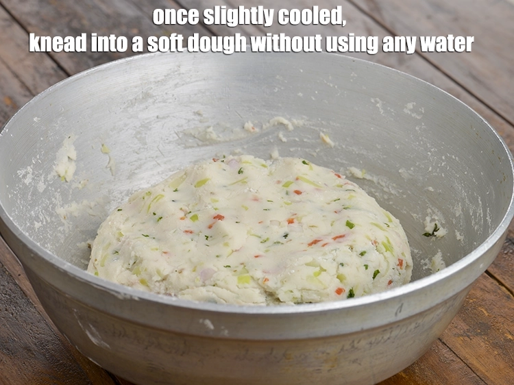 Step 5 – <p><span style="background-color:rgb(255,255,255);color:rgb(0,0,0);"><strong>Once slightly cooled</strong>, knead into a <strong>soft dough</strong> without using any water.</span></p>