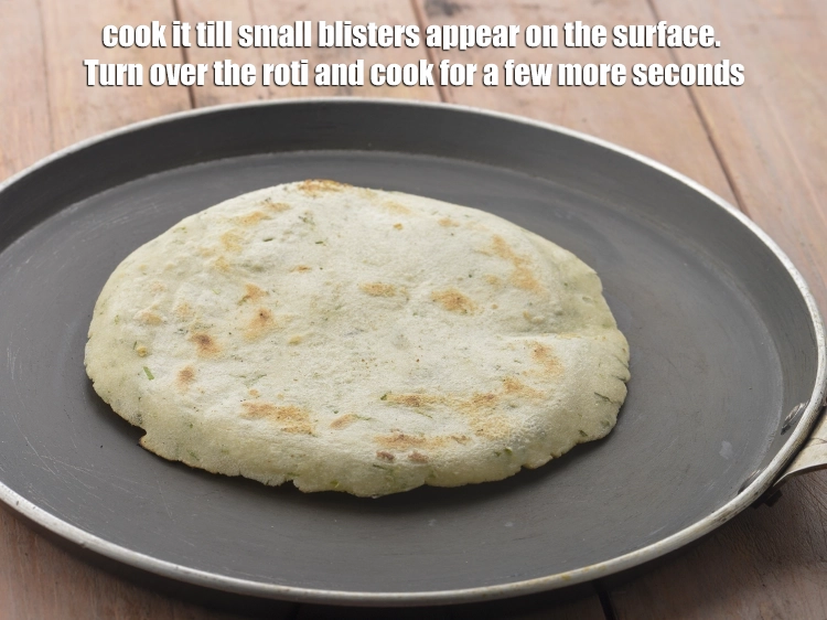 Step 6 – <p><span style="background-color:rgb(255,255,255);color:rgb(0,0,0);">Cook it till small blisters appear on the surface. Turn over the roti and …
