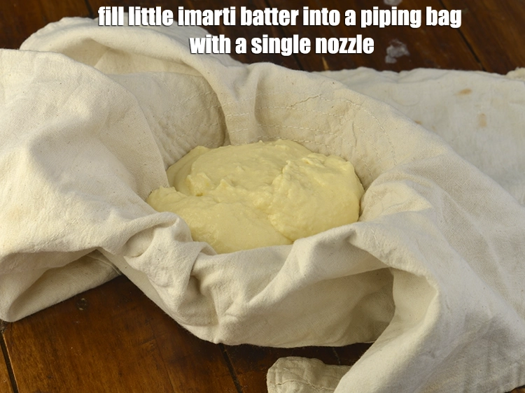 Step 9 – <p><span style="background-color:rgb(255,255,255);color:rgb(0,0,0);">Fill little <strong>imarti batter</strong> into a piping bag with a single nozzle or a …