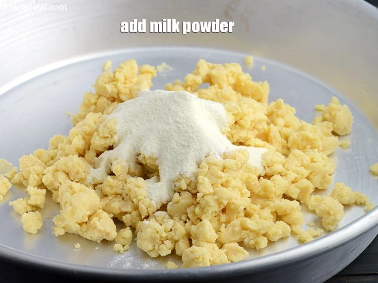 Step 12 – <p><span style="background-color:rgb(255,255,255);color:rgb(0,0,0);">Add 3 tbsp.&nbsp;</span><a href="https://www.tarladalal.com/glossary-milk-powder-517i"><u>milk powder</u></a><span style="background-color:rgb(255,255,255);color:rgb(0,0,0);">.</span></p>