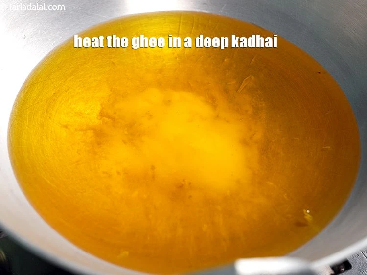 Step 18 – <p><span style="background-color:rgb(255,255,255);color:rgb(0,0,0);">To make <strong>gulab jamun</strong>, Heat the </span><a href="https://www.tarladalal.com/glossary-ghee-245i"><u>ghee</u></a><span style="background-color:rgb(255,255,255);color:rgb(0,0,0);">, in a deep kadhai. Make …