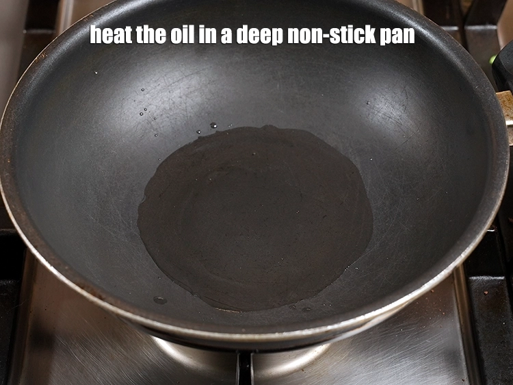 Step 6 – <p><span style="background-color:rgb(255,255,255);color:rgb(0,0,0);">Heat the 4 tbsp </span><a href="https://www.tarladalal.com/glossary-oil-671i"><u>oil</u></a><span style="background-color:rgb(255,255,255);color:rgb(0,0,0);"> in a deep non-stick kadhai.</span></p>