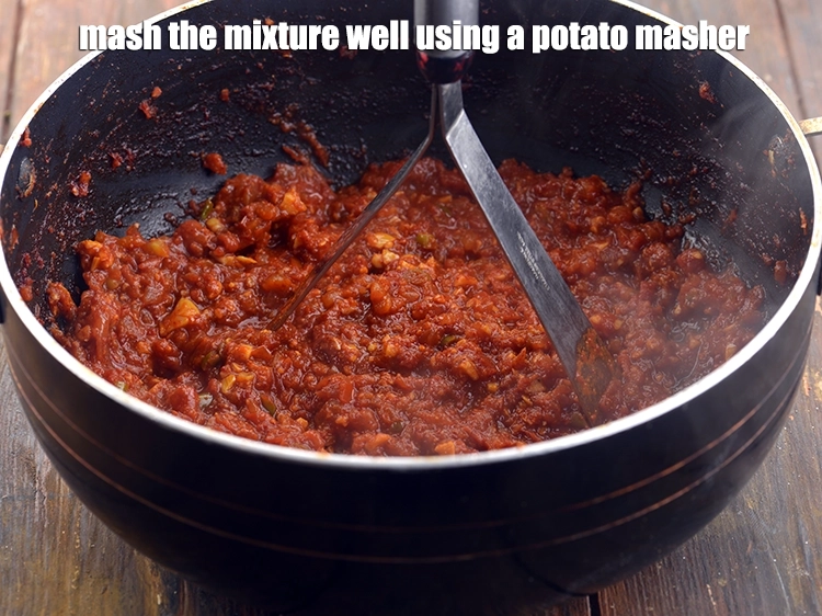 Step 14 – <p><span style="background-color:rgb(255,255,255);color:rgb(0,0,0);">Mash the mixture well using a potato masher.</span></p>