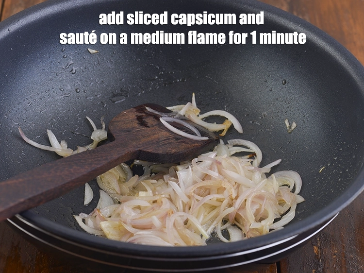 Step 23 – <p><span style="background-color:rgb(255,255,255);color:rgb(0,0,0);">Add the 1/2 cup </span><a href="https://www.tarladalal.com/glossary-onions-pyaz-pyaaz-kanda-548i#ing_2342"><u>sliced onions</u></a><span style="background-color:rgb(255,255,255);color:rgb(0,0,0);"> and <strong>sauté</strong> on a medium flame …