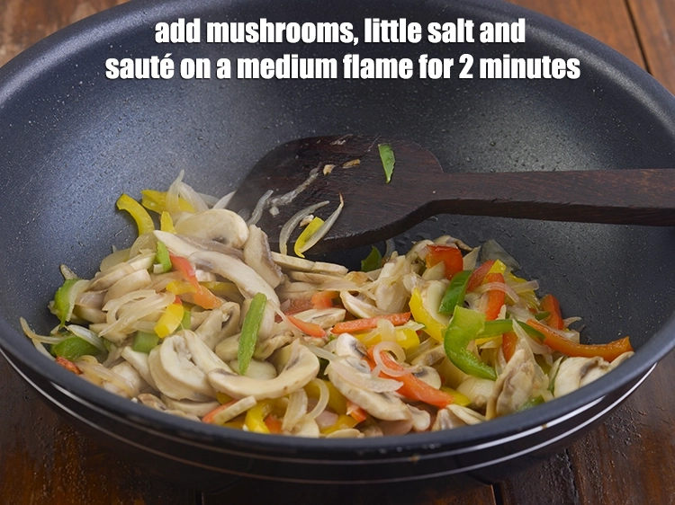 Step 25 – <p><span style="background-color:rgb(255,255,255);color:rgb(0,0,0);">Add the 2 cups thickly </span><a href="https://www.tarladalal.com/glossary-mushrooms-khumb-dhingri-493i#ing_2344"><u>sliced mushrooms (khumbh)</u></a><span style="background-color:rgb(255,255,255);color:rgb(0,0,0);">, little </span><a href="https://www.tarladalal.com/glossary-salt-namak-table-salt-418i"><u>salt </u></a><span …