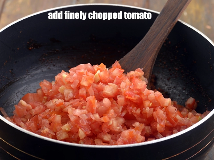 Step 11 – <p>Add the <span style="background-color:rgb(255,255,255);color:rgb(0,0,0);">2 1/2 cups finely </span><a href="https://www.tarladalal.com/glossary-tomatoes-tamatar-639i#ing_2361"><u>chopped tomato</u></a>.</p>