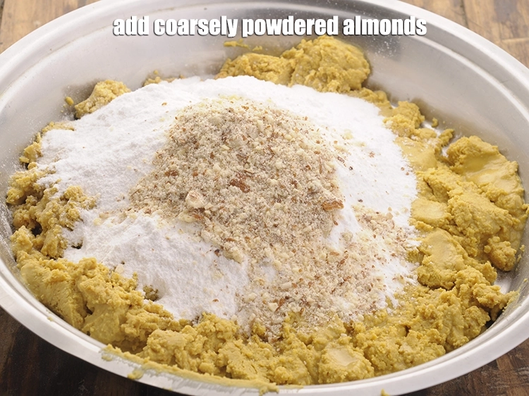 Step 5 – <p><span style="background-color:rgb(255,255,255);color:rgb(0,0,0);">Add coarsely </span><a href="https://www.tarladalal.com/glossary-powdered-almonds-powdered-badam-badam-ka-powder-889i"><u>powdered almonds (badam)</u></a><span style="background-color:rgb(255,255,255);color:rgb(0,0,0);">. You can toss in other dried fruits …