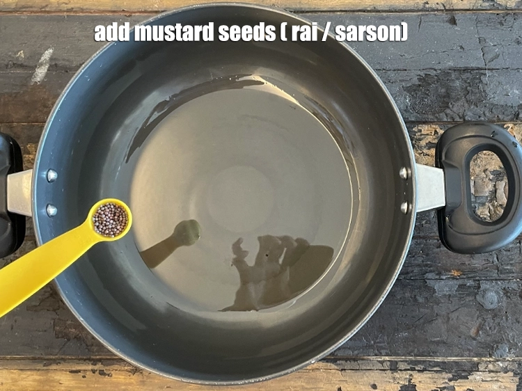 Step 3 – <html><head></head><body><p>Add&nbsp;1/2 tsp&nbsp;<a href="glossary-mustard-seeds-sarson-rai-sarson-ke-beej-525i">mustard seeds ( rai / sarson)</a>.</p></body></html>