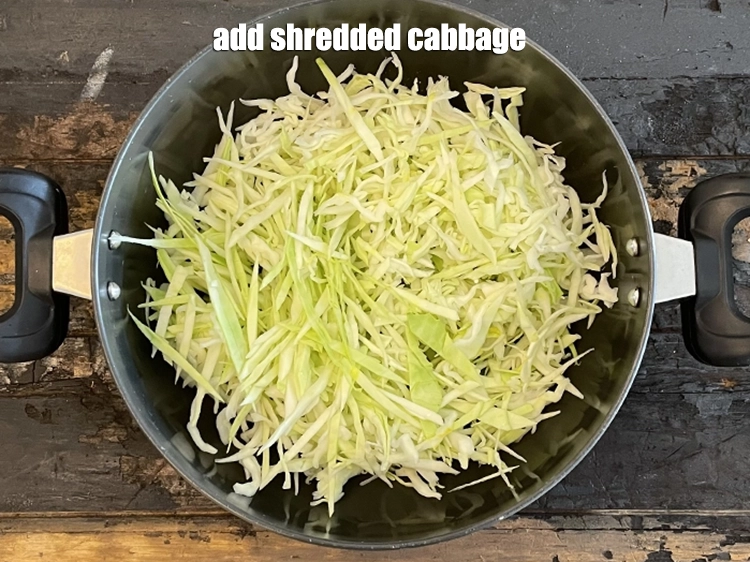 Step 8 – <html><head></head><body><p>Add&nbsp;3 cups&nbsp;<a href="glossary-shredded-cabbage-763i">shredded cabbage</a>.</p></body></html>