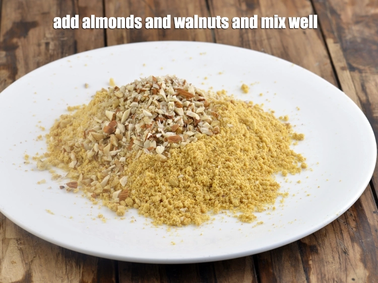 Step 11 – <p><span style="background-color:rgb(255,255,255);color:rgb(0,0,0);">Add the 2 tbsp. finely </span><a href="https://www.tarladalal.com/glossary-almonds-badam-378i#ing_3231"><u>chopped almonds (badam)</u></a><span style="background-color:rgb(255,255,255);color:rgb(0,0,0);"> and 2 tbsp. finely …