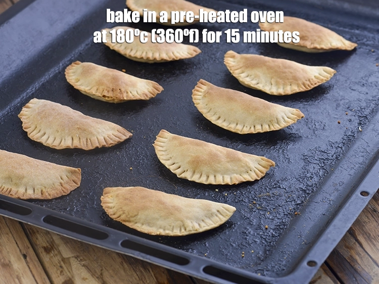 Step 19 – <p><span style="background-color:rgb(255,255,255);color:rgb(0,0,0);">Place them on a baking tray and <strong>bake</strong> in a pre-heated oven at 180ºc …