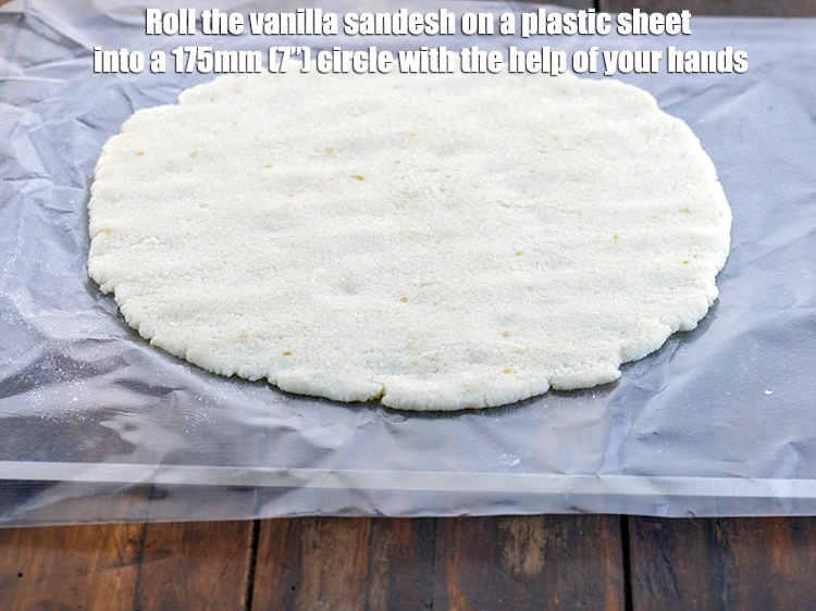 Step 3 – <p>Roll the <strong>vanilla sandesh</strong> on a plastic sheet into a 175mm (7”) circle with the …