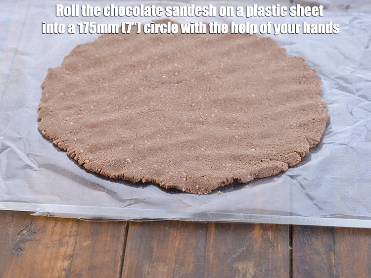Step 4 – <p><span style="background-color:rgb(255,255,255);color:rgb(0,0,0);"><strong>Roll</strong> the <strong>chocolate sandesh</strong> on a plastic sheet into a 175mm (7”) circle with …