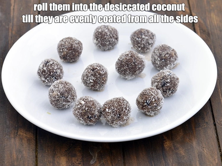 Step 4 – <p><span style="background-color:rgb(255,255,255);color:rgb(0,0,0);"><strong>Roll</strong> them into the </span><a href="https://www.tarladalal.com/glossary-desiccated-coconut-272i"><u>desiccated coconut</u></a><span style="background-color:rgb(255,255,255);color:rgb(0,0,0);"> till they are evenly coated from …