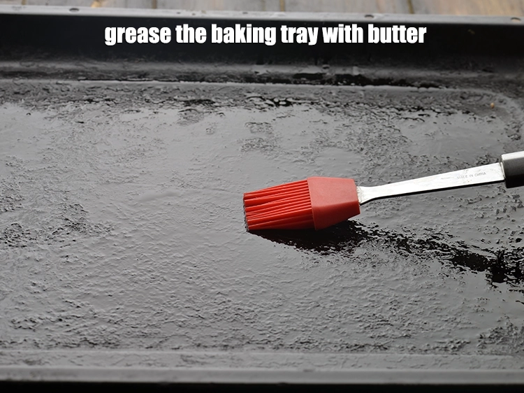 Step 16 – <p>To make the<strong> Choco Dip Cookies, &nbsp;</strong>grease the <strong>baking tray</strong> with <a href="https://www.tarladalal.com/glossary-butter-makhan-233i"><u>butter</u></a>.</p>