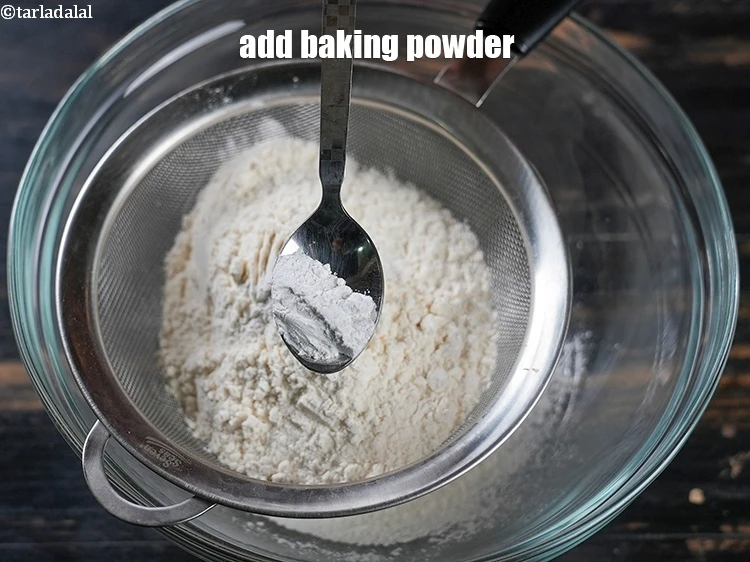 Step 4 – <p><span style="background-color:rgb(255,255,255);color:rgb(0,0,0);">Add the 1 tsp </span><a href="https://www.tarladalal.com/glossary-baking-powder-425i"><u>baking powder</u></a><u>.</u></p>