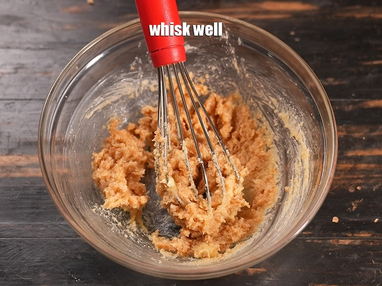 Step 3 – <p><span style="background-color:rgb(255,255,255);color:rgb(0,0,0);">Whisk well. Divide the mixture into 4 equal portions and keep aside.</span></p>