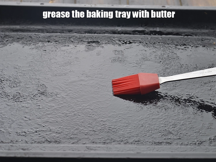 Step 9 – <p><span style="background-color:rgb(255,255,255);color:rgb(0,0,0);">grease the </span><strong>baking tray</strong><span style="background-color:rgb(255,255,255);color:rgb(0,0,0);"> with </span><a href="https://www.tarladalal.com/glossary-butter-makhan-233i"><u>butter</u></a><u>.</u></p>
