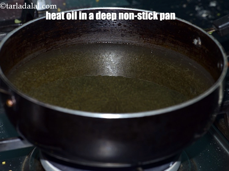 Step 16 – <p><span style="background-color:rgb(255,255,255);color:rgb(0,0,0);">Heat the </span><a href="https://www.tarladalal.com/glossary-oil-671i"><u>oil</u></a><span style="background-color:rgb(255,255,255);color:rgb(0,0,0);"> in a deep non-stick pan.</span></p>