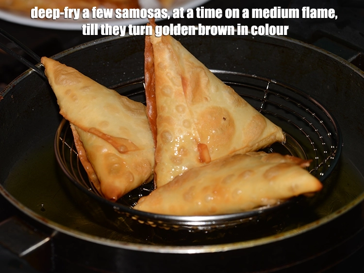 Step 17 – <p><span style="background-color:rgb(255,255,255);color:rgb(0,0,0);">Deep-fry a few <strong>samosas</strong>, at a time on a medium flame, till they turn …