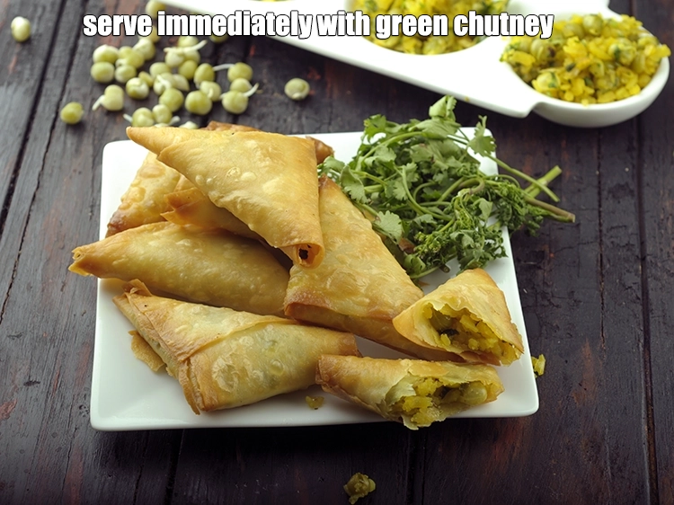 Step 19 – <p><span style="background-color:rgb(255,255,255);color:rgb(0,0,0);">Serve <strong>Poha and Sprouted Vatana Samosa</strong> immediately with </span><a href="https://www.tarladalal.com/glossary-green-chutney-2401i"><u>green chutney</u></a>.</p>