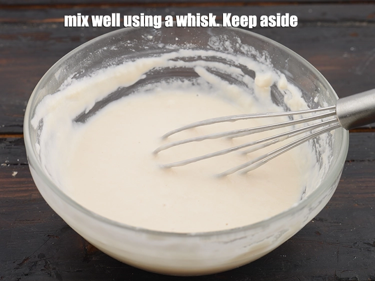 Step 8 – <p><span style="background-color:rgb(255,255,255);color:rgb(0,0,0);"><strong>Mix well </strong>using a whisk. Keep aside.</span></p>