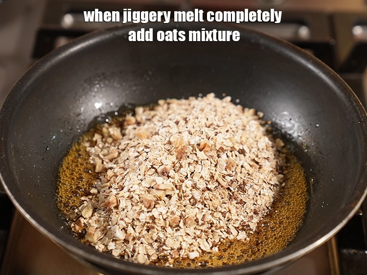 Step 12 – <p><span style="background-color:rgb(255,255,255);color:rgb(0,0,0);">When<strong> jiggery melt</strong> <strong>completely</strong> add <strong>oats mixture</strong> on same pan.</span></p>