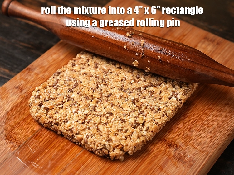 Step 16 – <p><span style="background-color:rgb(255,255,255);color:rgb(0,0,0);">Roll the mixture into a 4” x 6” rectangle using a greased rolling pin.</span></p>