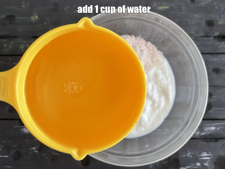 Step 3 – <p>Add <a href="https://www.tarladalal.com/glossary-salt-namak-table-salt-418i"><u>salt </u></a><span style="background-color:rgb(255,255,255);color:rgb(0,0,0);">to taste and 1 cup of <strong>water</strong>.</span></p>