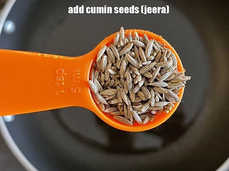 Step 6 – <p><span style="background-color:rgb(255,255,255);color:rgb(0,0,0);">Add the 1 tsp </span><a href="https://www.tarladalal.com/glossary-cumin-seeds-jeera-zeera-381i"><u>cumin seeds (jeera)</u></a><u>.</u></p>