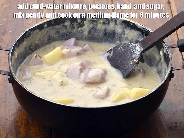 Step 9 – <p><span style="background-color:rgb(255,255,255);color:rgb(0,0,0);">Add the <strong>curd-water mixture</strong>, 1 cup </span><a href="https://www.tarladalal.com/glossary-potatoes-aloo-alu-batata-710i#ing_2605"><u>boiled potato cubes</u></a><span style="background-color:rgb(255,255,255);color:rgb(0,0,0);">, 1 cup </span><a …