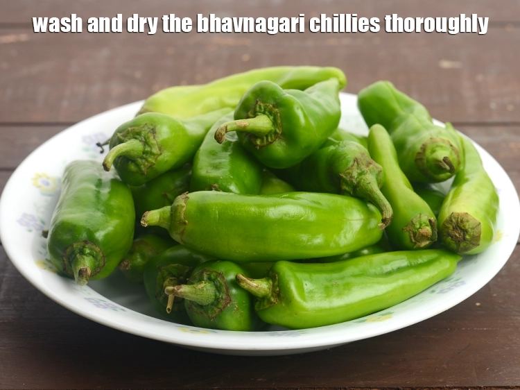 Step 1 – <p>To make the <strong>Raiwala Marcha</strong>, <span style="background-color:rgb(255,255,255);color:rgb(0,0,0);">Wash and dry the 20 </span><a href="https://www.tarladalal.com/glossary-bhavnagri-chillies-bhavnagri-mirchi-337i"><u>bhavnagri chillies</u></a><span style="background-color:rgb(255,255,255);color:rgb(0,0,0);"> …