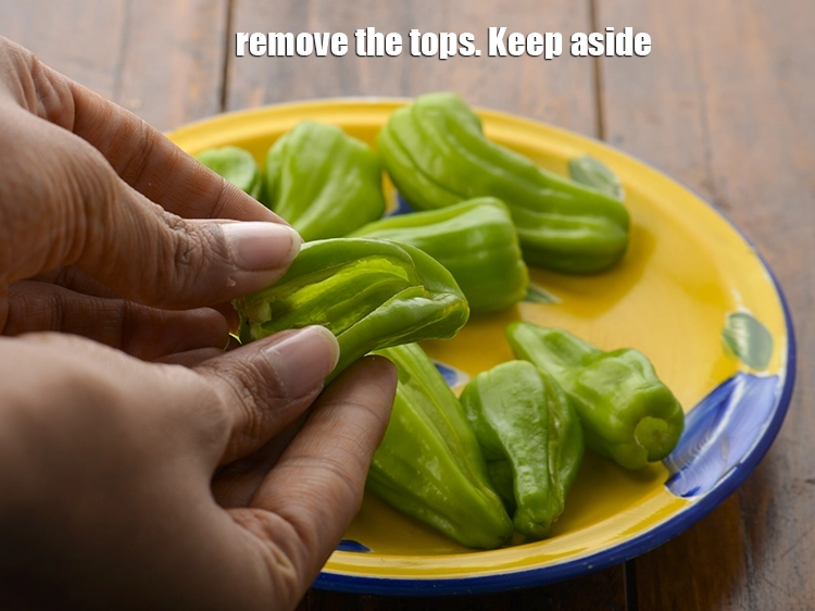Step 4 – <p><span style="background-color:rgb(255,255,255);color:rgb(0,0,0);">Remove the tops. Keep aside.</span></p>