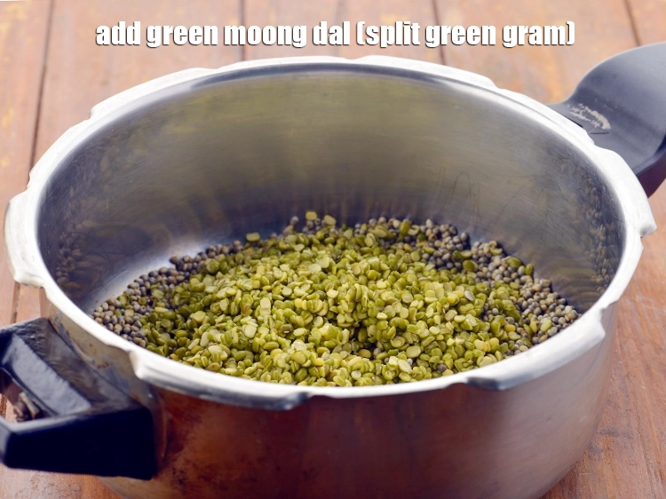 Step 9 – <p>Add the <a href="https://www.tarladalal.com/glossary-green-moong-dal-split-green-gram-hari-mung-dal-522i"><u>green moong dal (split green gram)</u></a>.</p>