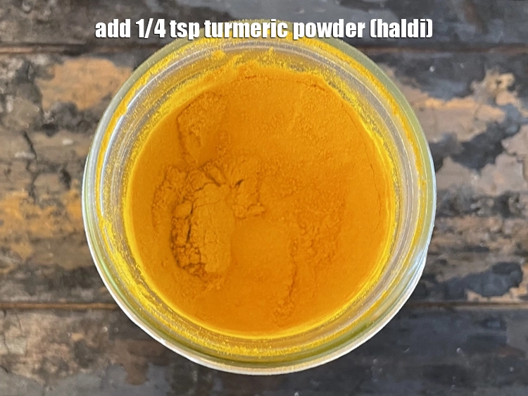 Step 9 – <html><head></head><body><p>Add&nbsp;1/4 tsp&nbsp;<a href="glossary-turmeric-powder-haldi-645i">turmeric powder (haldi)</a>.&nbsp;Turmeric helps in digestion of food thus helping to overcome indigestion.&nbsp;Haldi …