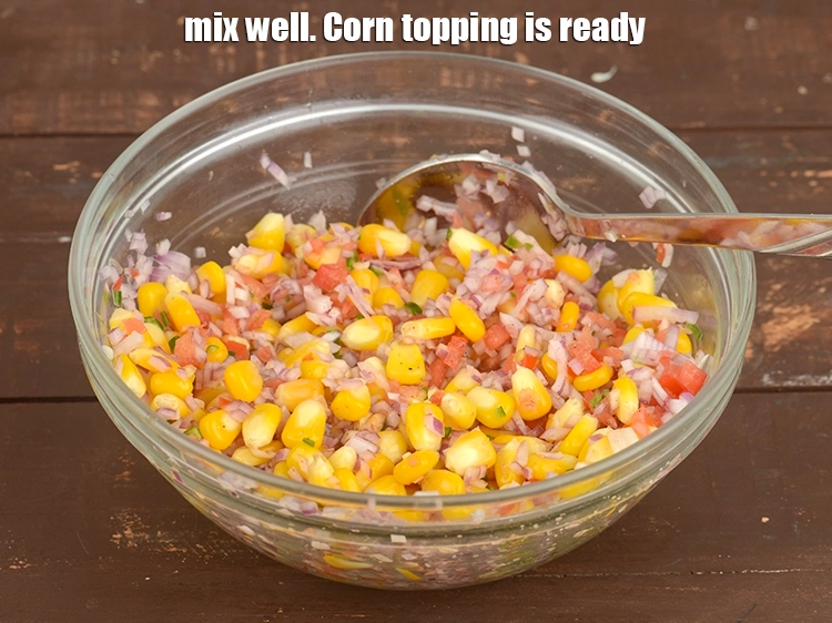 Step 24 – <p><span style="background-color:rgb(255,255,255);color:rgb(0,0,0);">Mix well. <strong>Corn topping is ready</strong>.</span></p>