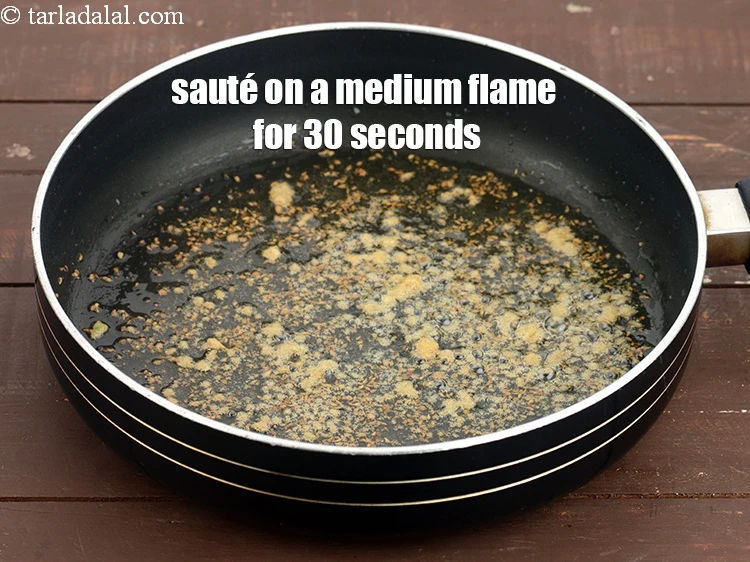 Step 9 – <p><span style="background-color:rgb(255,255,255);color:rgb(0,0,0);"><strong>Sauté </strong>on a medium flame for 30 seconds.</span></p><figure class="image image_resized" style="height:auto;width:0px;"><img src="https://cdn.tarladalal.com/media/recipe/method/2025/01/16/step-5_chaat_saut%C3%83%C2%A9-on-a-medium-flame-for-30-seconds-5-197896.webp" alt=""></figure>