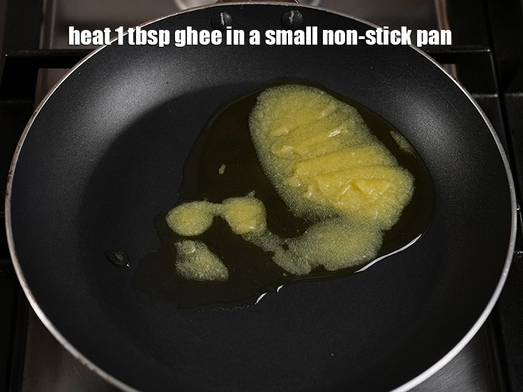 Step 14 – <p><span style="background-color:rgb(255,255,255);color:rgb(0,0,0);">For tempering, heat 1 tbsp&nbsp;</span><a href="https://www.tarladalal.com/glossary-ghee-245i"><u>ghee</u></a><span style="background-color:rgb(255,255,255);color:rgb(0,0,0);"> in a small non-stick pan.</span></p>