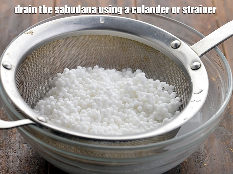 Step 4 – <p><span style="background-color:rgb(255,255,255);color:rgb(0,0,0);"><strong>Drain</strong> the <strong>sabudana</strong> using a colander or strainer.</span></p>