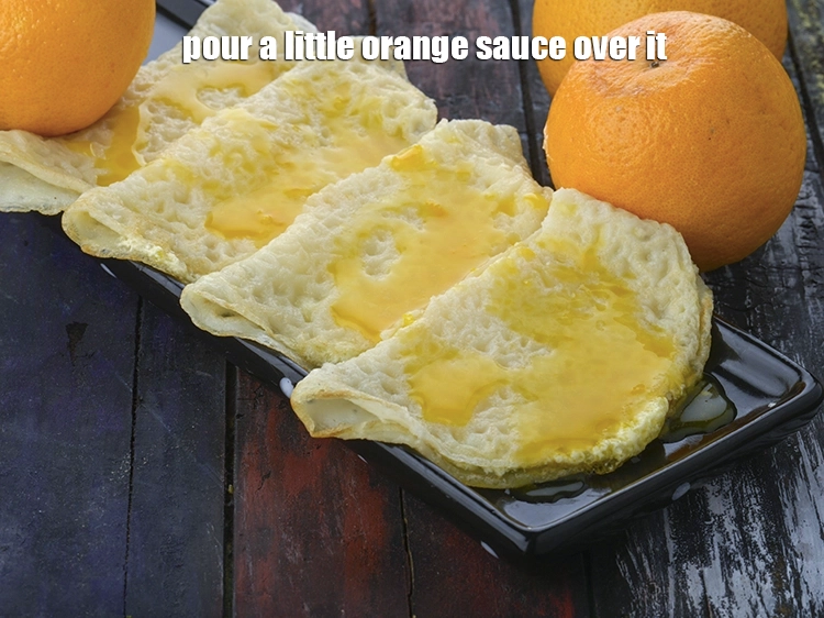 Step 20 – <p><span style="background-color:rgb(255,255,255);color:rgb(0,0,0);"><strong>Just before serving</strong>, place each orange filled crêpe on a serving plate, pour a …