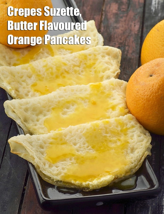 Step 21 – <p><span style="background-color:rgb(255,255,255);color:rgb(0,0,0);">Serve <strong>Crepes Suzette, Butter Flavoured Orange Pancakes</strong> immediately.</span></p>