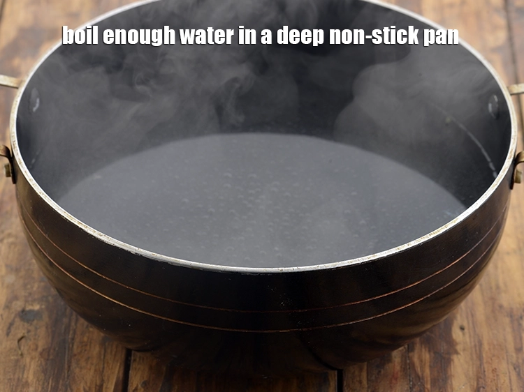 Step 13 – <p>Boil enough <strong>water</strong> in a deep non-stick pan.</p>