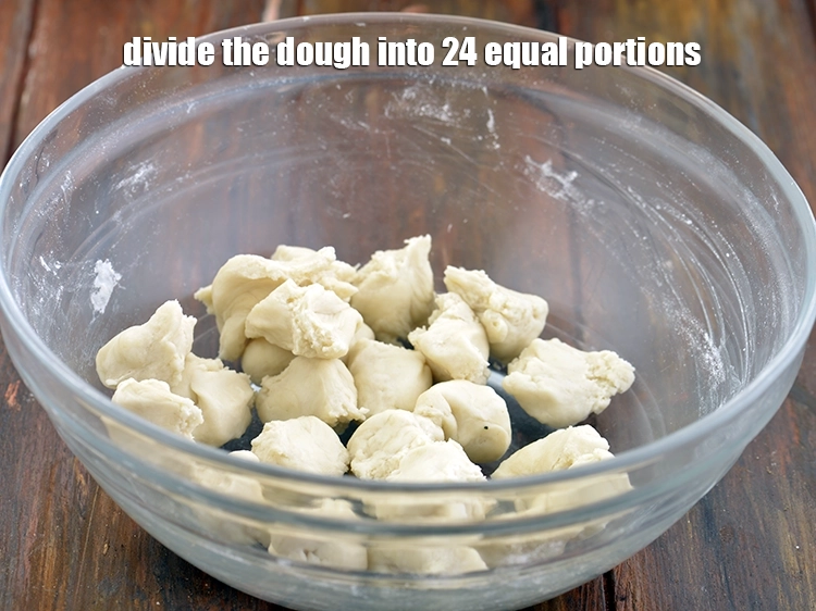 Step 8 – <p><span style="background-color:rgb(255,255,255);color:rgb(0,0,0);">Divide the <strong>dough</strong> into 24 equal portions.</span></p>