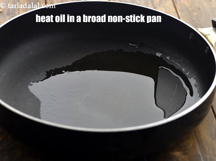 Step 17 – <p>To prepare <strong>Green Thai Curry</strong>, heat the <span style="background-color:rgb(255,255,255);color:rgb(0,0,0);">1 tbsp </span><a href="https://www.tarladalal.com/glossary-oil-671i"><u>oil</u></a> in a broad …